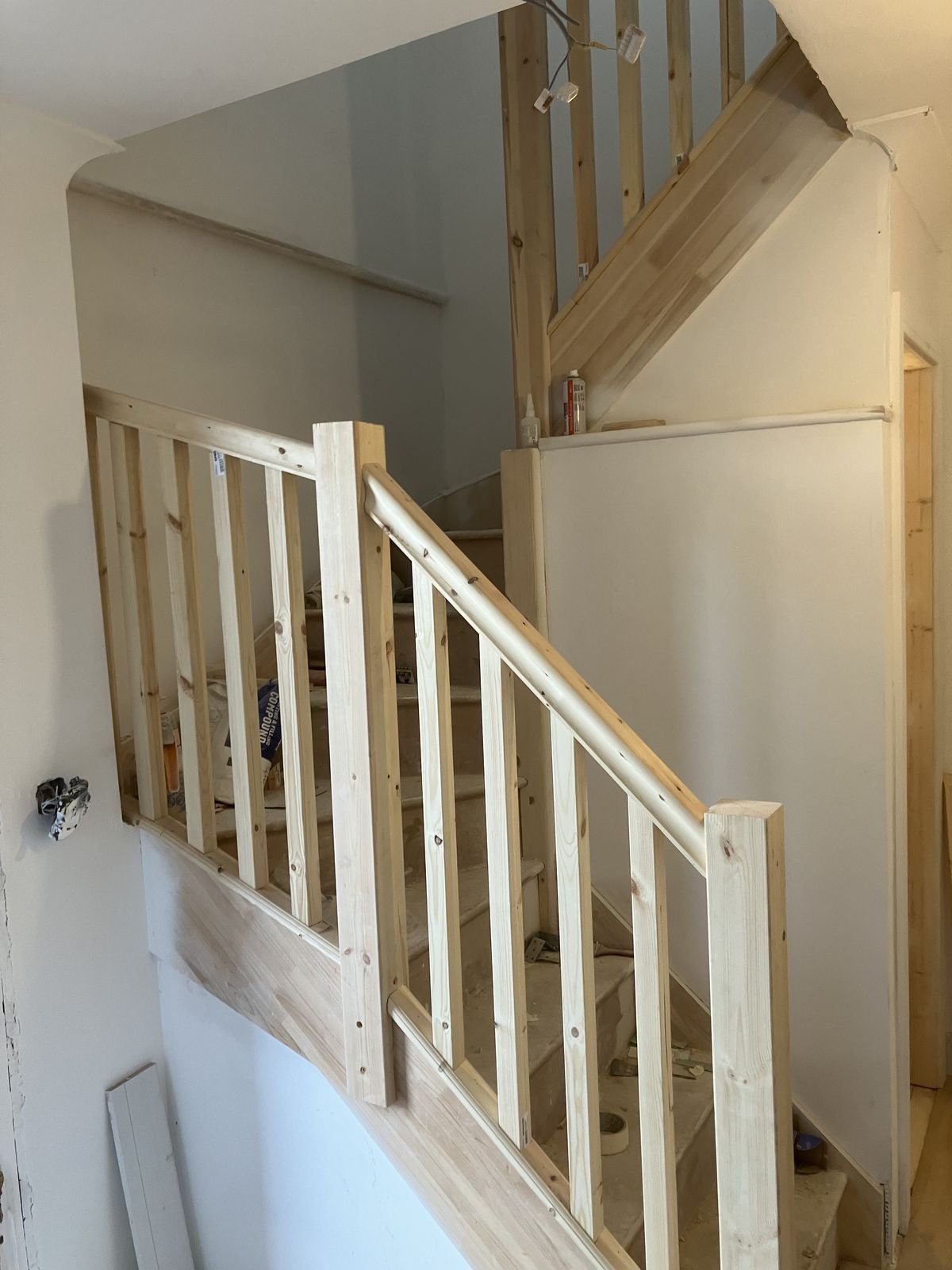 A new staircase with newel posts and spindles