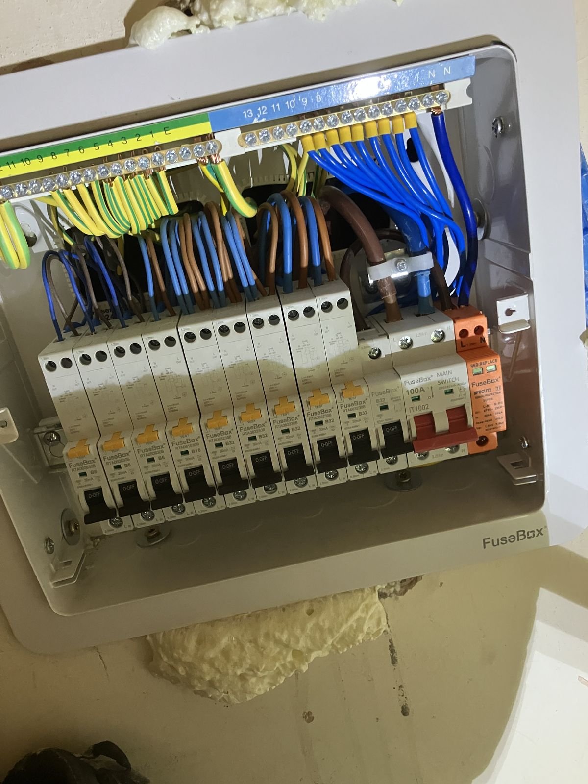 A new consumer unit with the cabling neatly run in